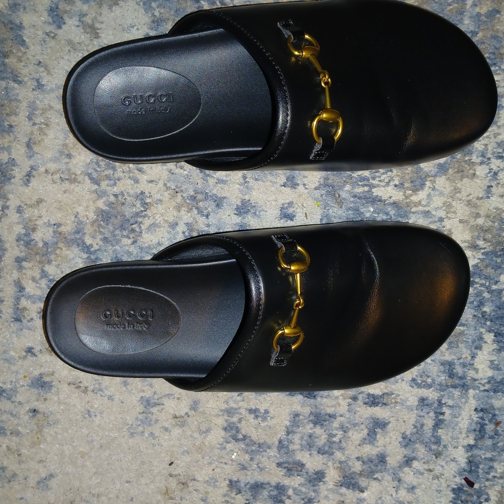 Gucci Black Slides with Gold Accents